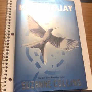 Hard cover Mockingjay with book cover